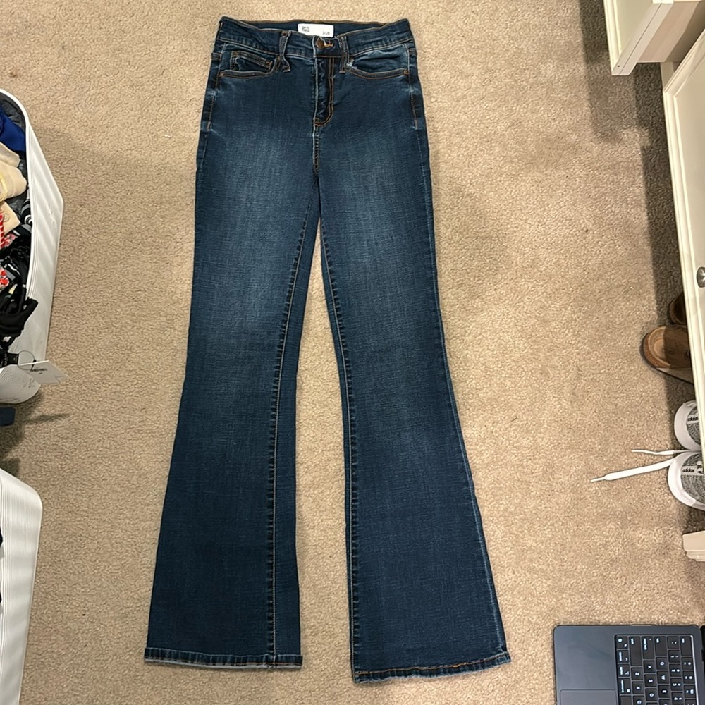 Dark blue high waisted jeans. Size 3/w26.